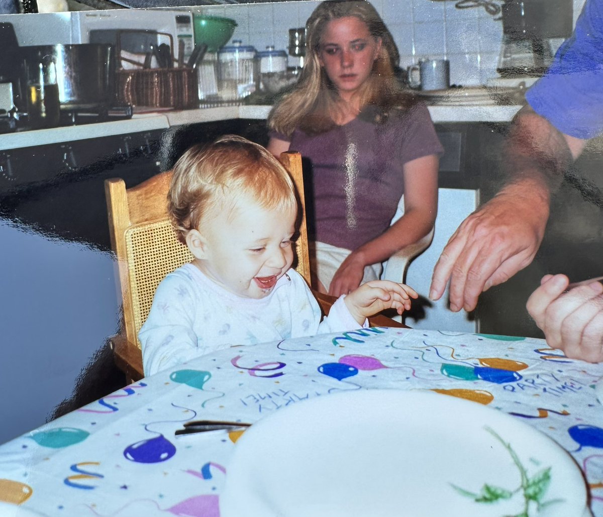 I look thrilled to be at my niece’s first birthday party. 😂