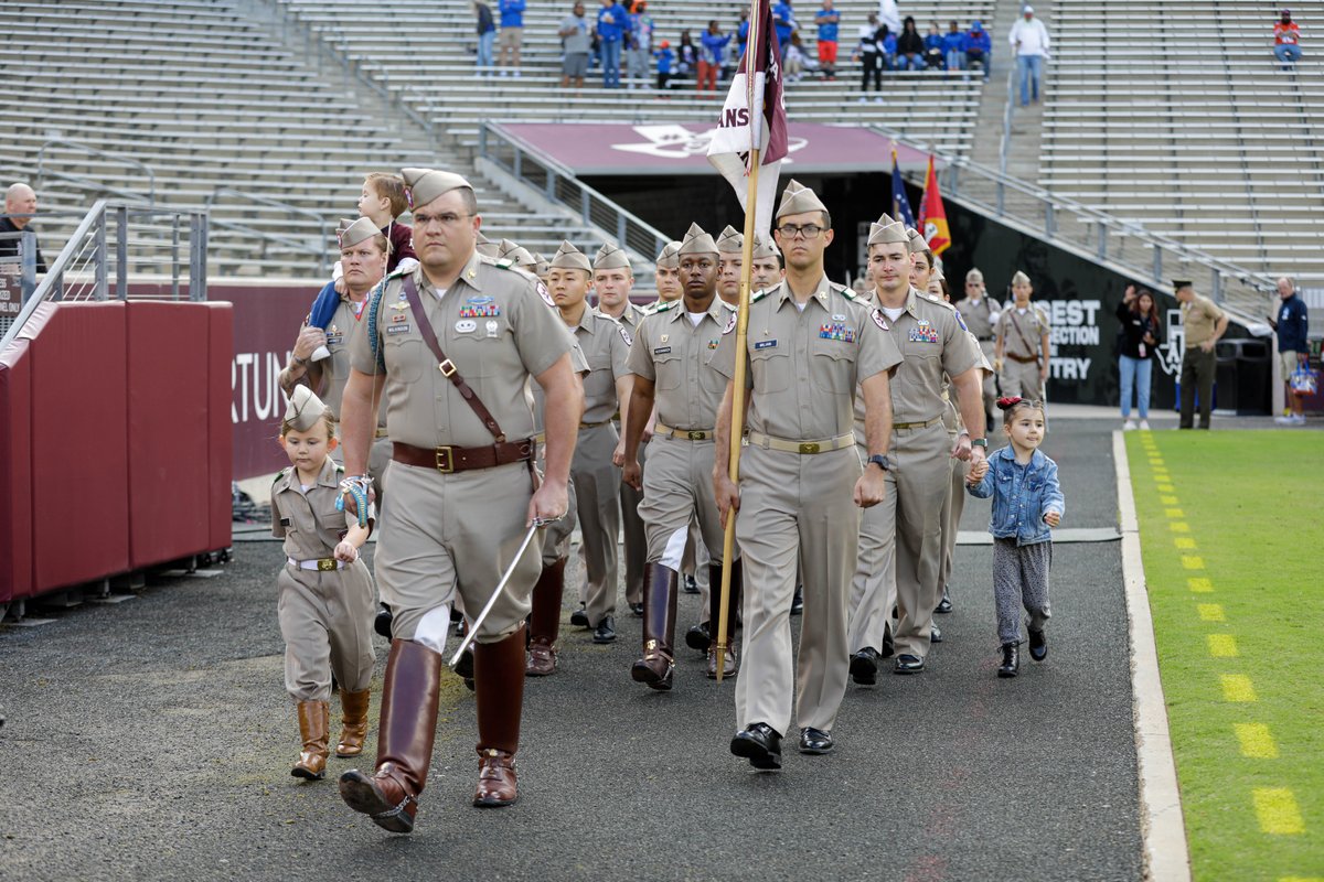 Delta Company, a unit in the @AggieCorps comprised solely of military veterans, marched with some of their children before a football game last year! 

We'd like to wish them, and all our veteran and active-duty Aggie dads, a very #HappyFather's Day!