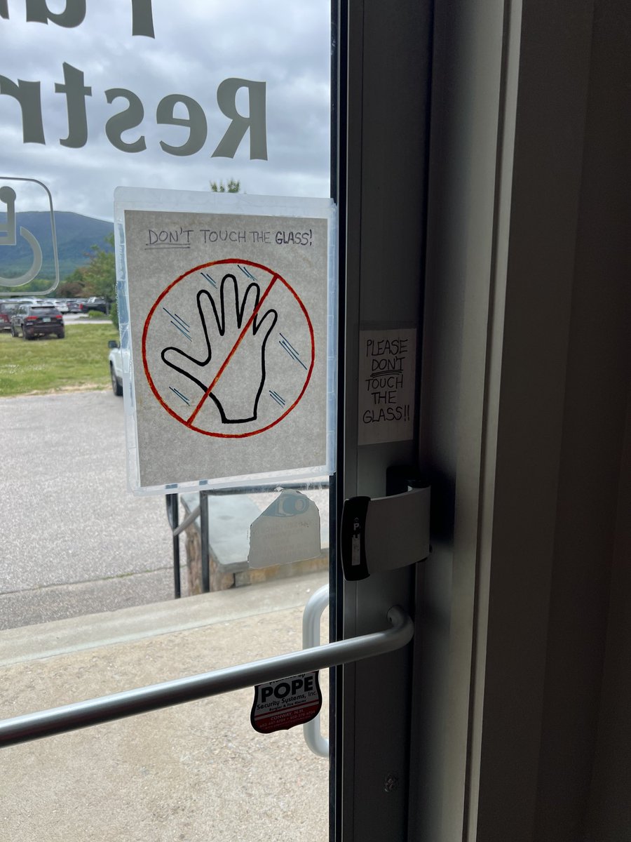 Mahhcc's tweet photo. Stupid busy body sign of the day. What do we think people do when they see a sign like this? They touch the glass. Every time. https://t.co/62Vu2dmaYn