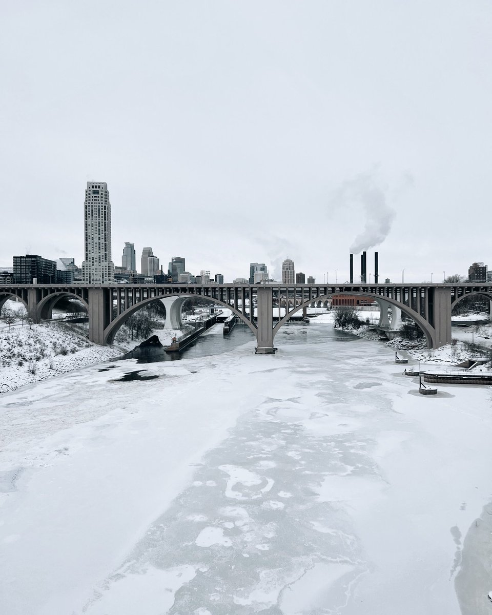 01-02-2023 | Looking towards Minneapolis across a frozen Mississippi River on a gray winter day. 

#Minneapolis #WINTER #cityscape