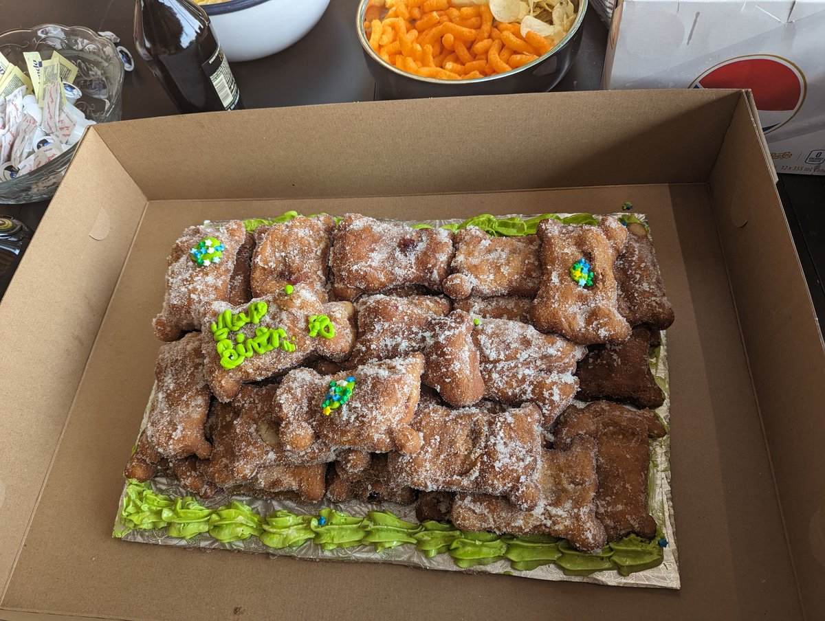NehaTSingh's tweet image. A true @GreaterSudbury birthday cake made of &quot;Jelly Pigs&quot; a special #Finnish version of a doughnut from Leinalas! @CBCSudbury @SudburyStar