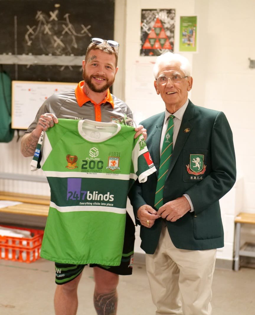 An emotional pre-match presentation as Bob Pickles, the man who set him on his professional career, presents Jimmy Watson with  his 200th appearance match shirt. Photo courtesy of Paul Johnson