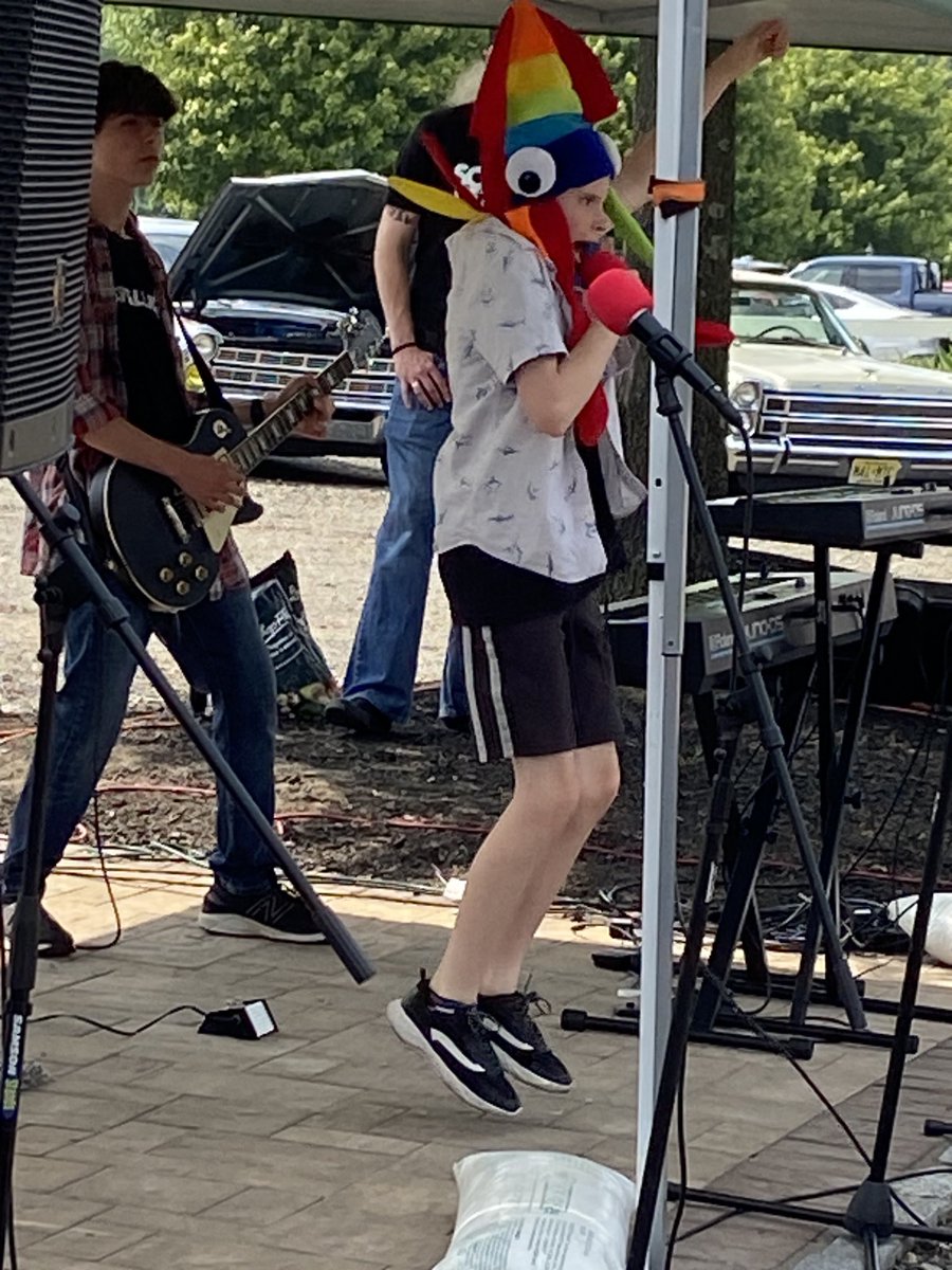 DrJessBW's tweet photo. On the guitar and singing Rage Against the Machine - he’s bringing it! #rockermom is proud! #90sShow ⁦@SchoolofRockUSA⁩ https://t.co/hgi7IKWnoY