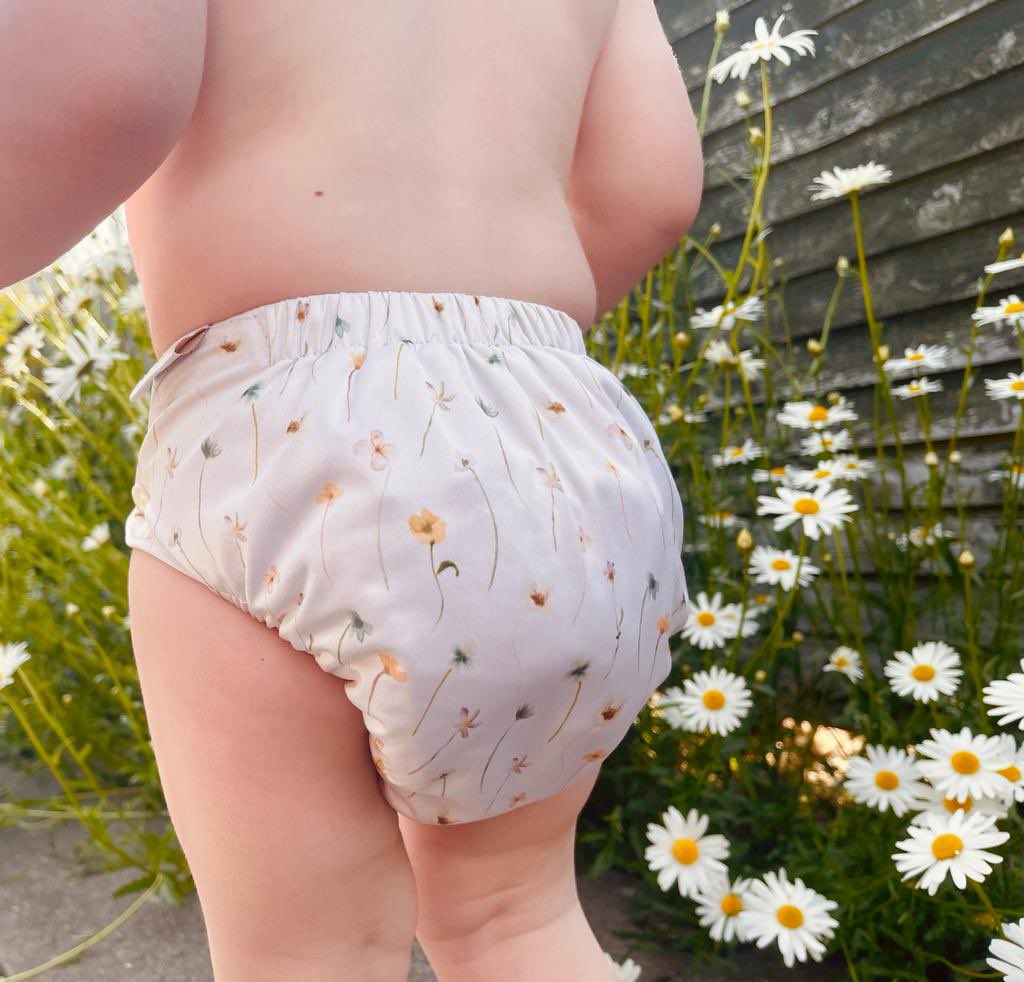 The Little Man is loving the sun. Suns out, Cloth Bums Out. Check out our nappies at cosyandfair.com We
are small family run business based in Northern Ireland, our prints are exclusive to our brand! #supportsmallbusiness #reusablenappy #ecobaby #eco