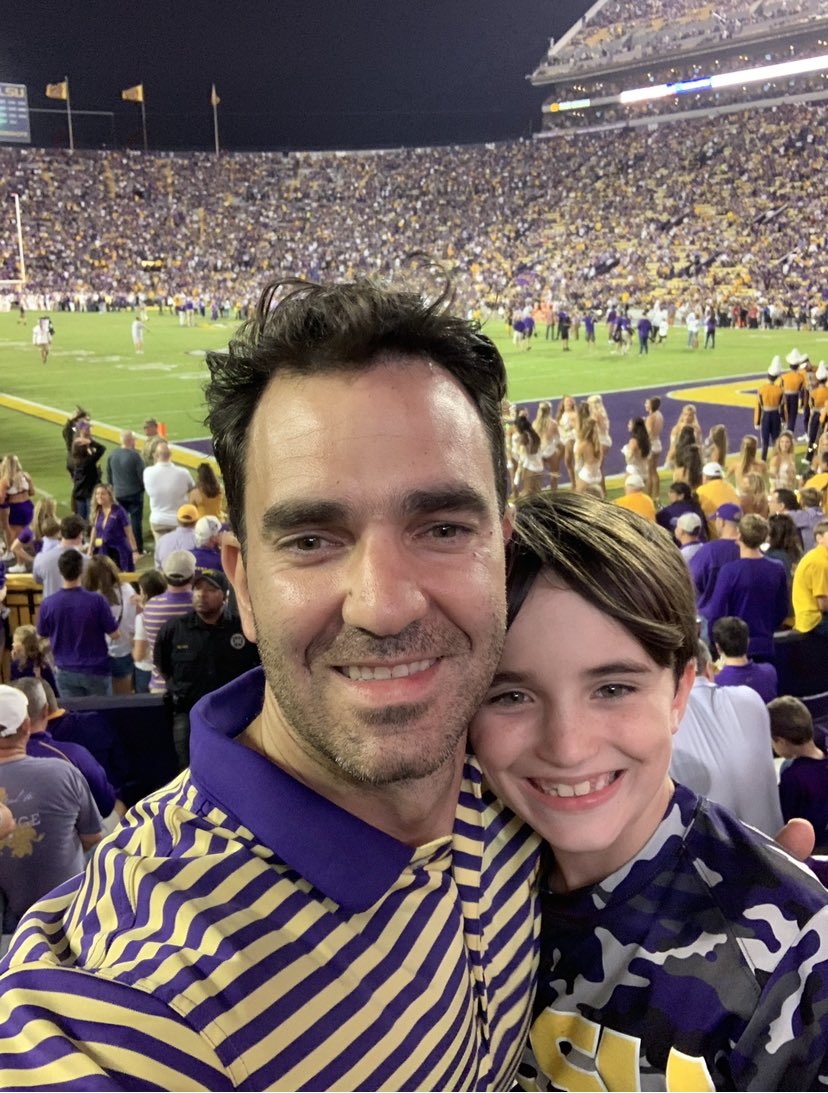 joehambor's tweet photo. @LSUfootball I will go some favorite memories as a dad. Glad I had a daughter who stormed the field taking down Georgia and a son who got to watch Burreaux! https://t.co/fdpwShmA9I