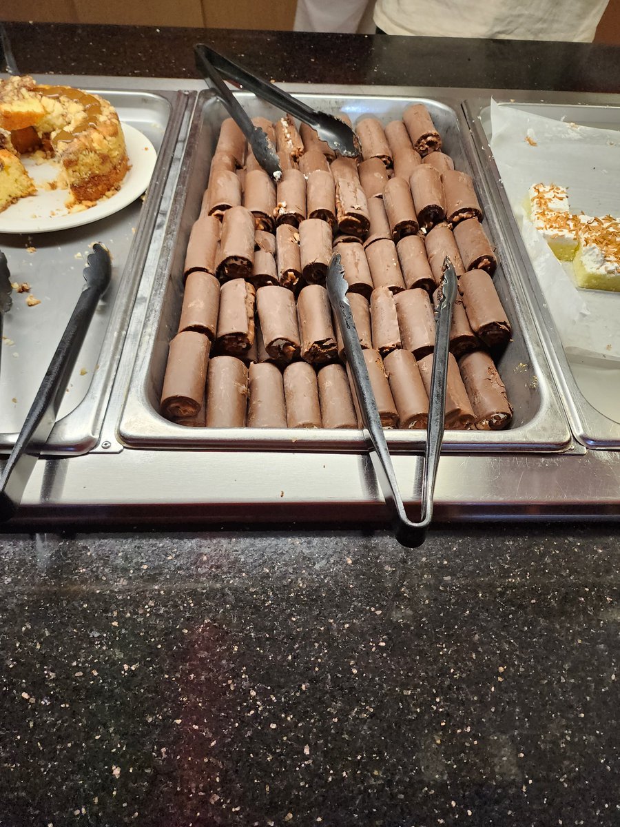_geraff's tweet image. Swiss rolls at buffet is wild