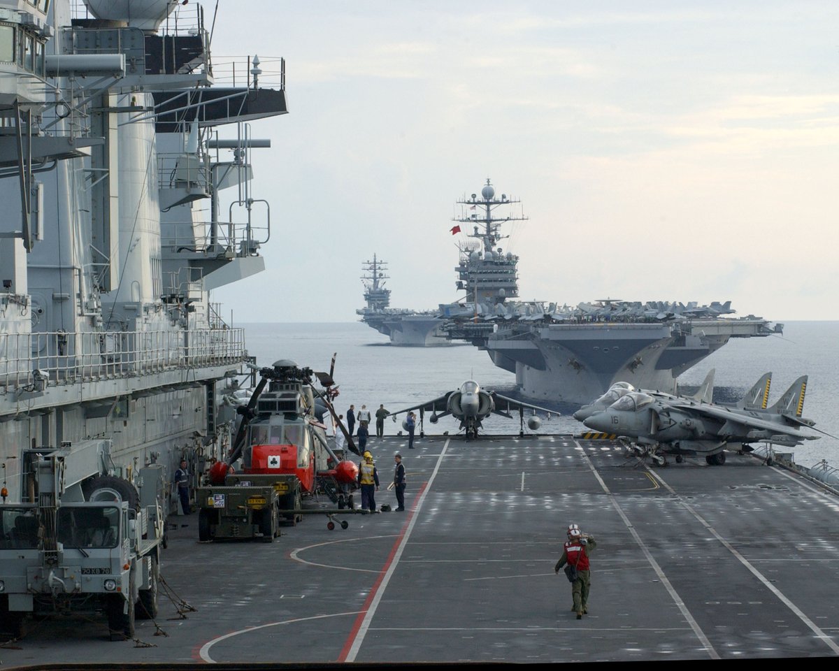 USMC Harriers and Ospreys embarked on the Invincible class carrier HMS Illustrious