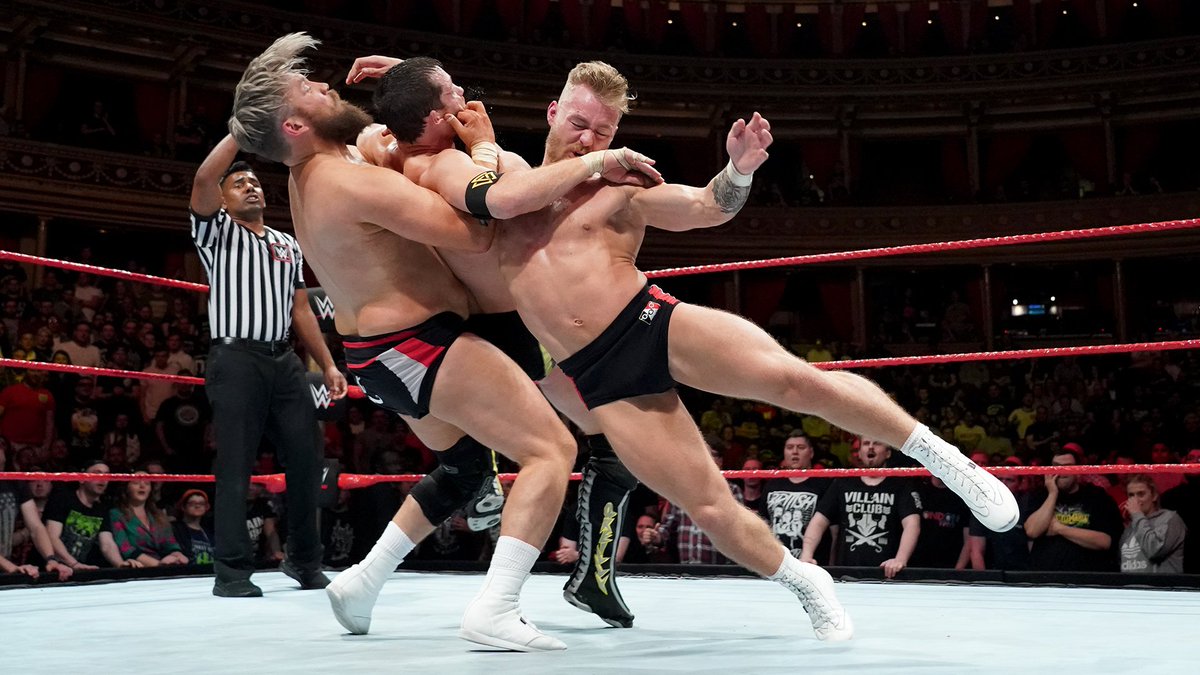 NXTUK_Legacy's tweet image. June 18, 2018:

On Night One of the United Kingdom Championship Tournament at Royal Albert Hall, #BritishStrongStyle (@PeteDunneYxB, #TylerBate, @trentseven) defeated #UndisputedEra (@AdamColePro, @KORcombat, @roderickstrong) in a six-man tag match.

📸 WWE

#NXTUK