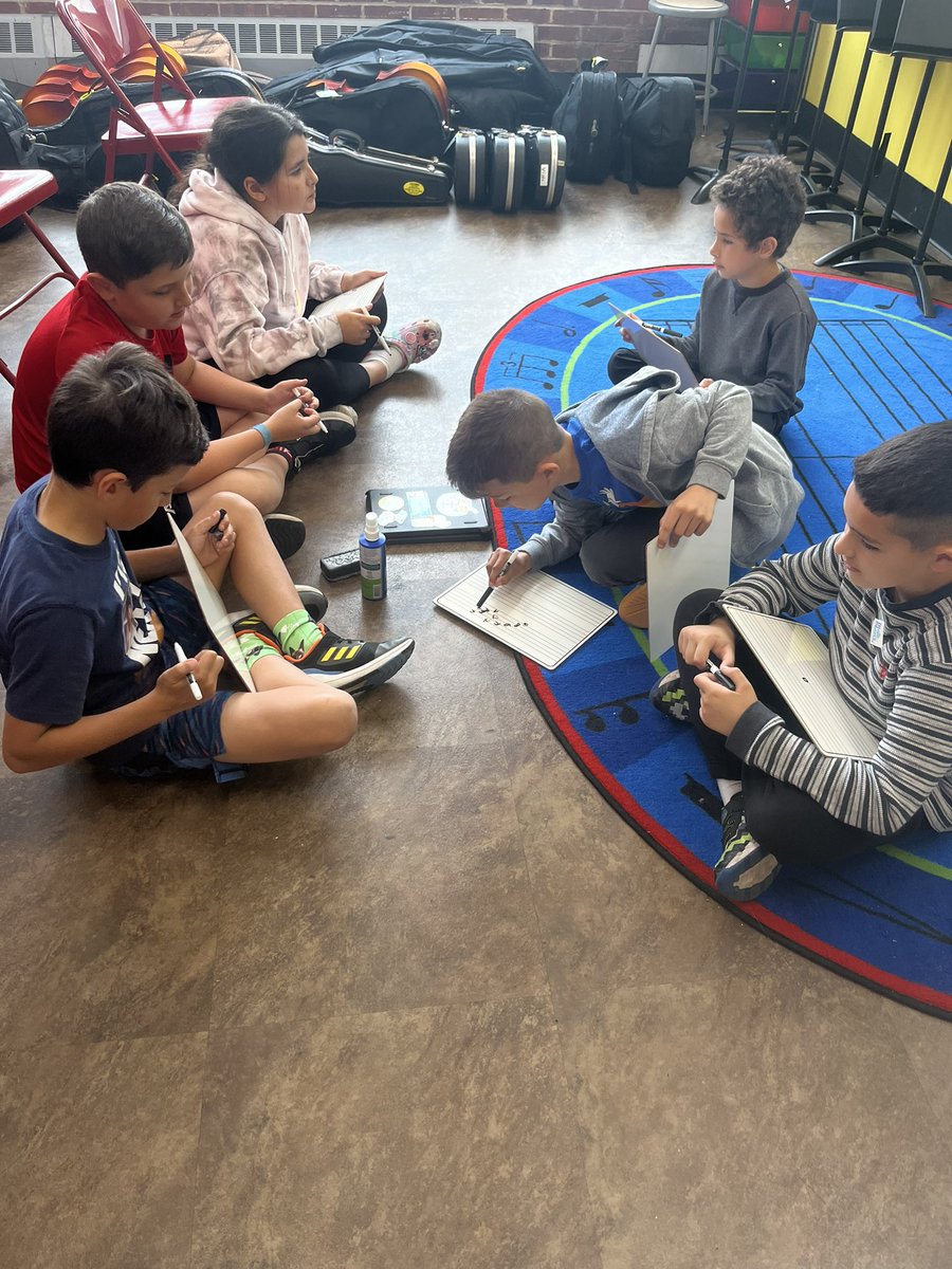 3rd grade musicians practicing their note reading skills to prepare for 4th grade Orchestra #jacksonbrave #mineolaproud