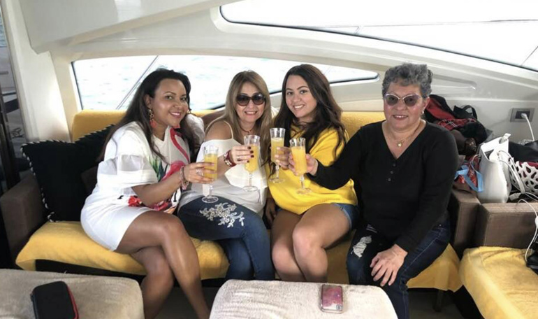 A group of ladies share a toast for Mothers Day on the Black Ice yacht.  #miami #travel #miamitours