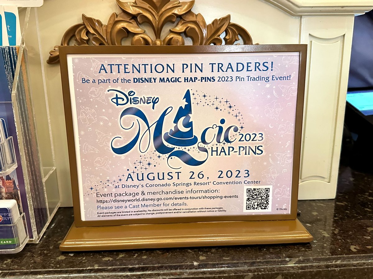 We found new signage for the Magic Hap-PINS event inside of Main Street Cinema at Magic Kingdom. The pin trading event will be taking place at Disney’s Coronado Springs Resort on August 25 and 26.