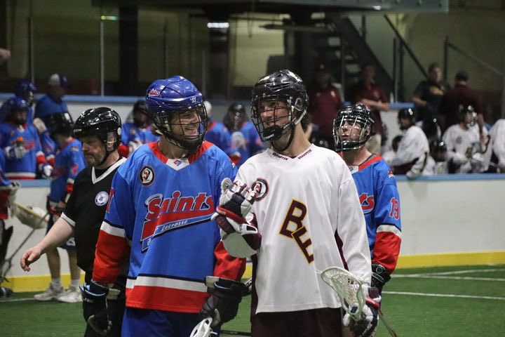 Matt Pierera &amp; Emmett(Blue)⁦<a href="/EverestLax/">Everest Academy Lacrosse</a>⁩ Alumni sharing a laugh during their game. Life is good. Love what you do!