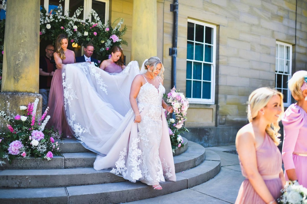 🕊️Gorgeous Jess on her summer wedding day! A beautiful entrance by our bride that certainly had the WOW factor! 😍⁠
⁠
⁠
⁠
#elysee #realbride #summerbride #summerwedding