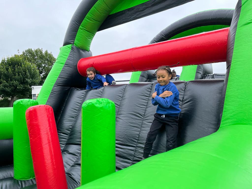 RosaryPrimary's tweet photo. The children had so much fun today on this giant inflatable obstacle course 
Thank you to @letsleaptweets for bringing it in today. We loved it 🤩 https://t.co/TDuUcA6Aqi