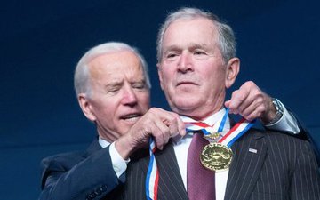 Joe Biden pinning the medal of freedom on George W. Bush. 