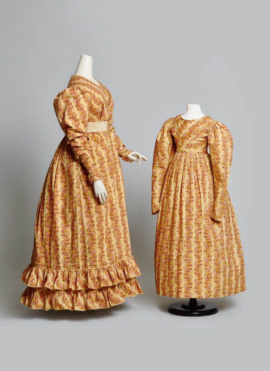 Long before Lanvin made mother/daughter dressing fashionable, it was economical to buy longer lengths of fabric from which to make multiple gowns. These two are rare survivals, #1820s printed cottons sold via #coraginsburg #fashionhistory