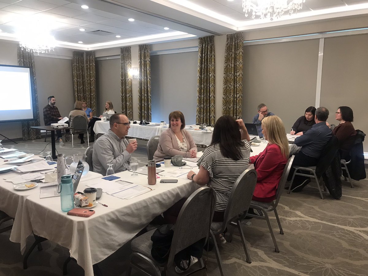 Board members discussing big picture trends regarding regulation, education, and practice and the connection to NLCSW’s 2023-24 action plan.