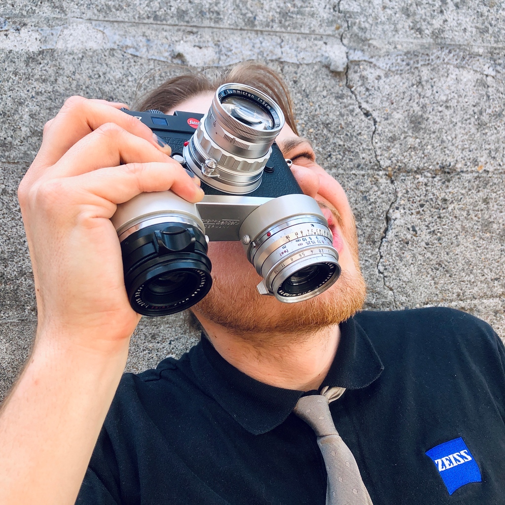 This Benser Dual Plate is one of the most unique items we have in stock currently. Slipping over the baseplate most M's (like this sharp M7), it allows two lenses to attach to the bottom. It looks strange but actually works well, facilitating quick changes between lenses.