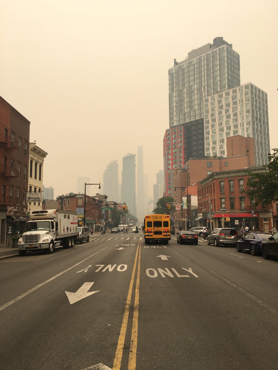 trevorcdolan's tweet photo. The view of Manhattan from Flatbush Ave today. This is what living through the climate crisis looks like. https://t.co/QZdej0NkLM