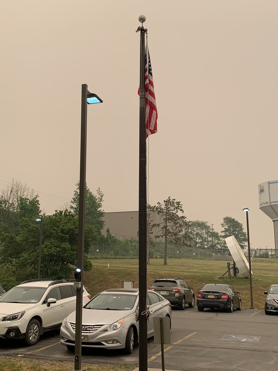 dopplerDK's tweet photo. The Sun was gone and smoke so thick that the parking lot and building lights came on here at NWS BGM! Pretty chilly too. Pictures taken around 9:45am. Check out @NWSBinghamton  for an even more striking picture from this morning.  #NYwx https://t.co/SKVotkNtQr