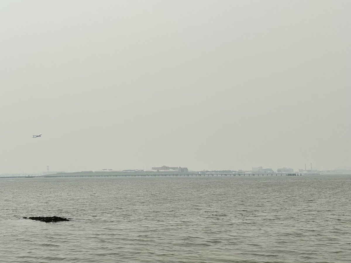 GASgambati's tweet photo. NYC blanketed with Canadian wildfire smoke (now and before.) Current weather: 74F, partly cloudy skies. Location: opposite LaGuardia Airport https://t.co/MSgAQUkQKy