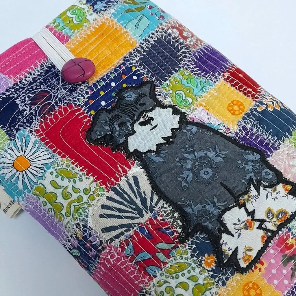 Calling all Schnauzer lovers! 

This adorable handmade book sleeve is the perfect gift for the dog lover in your life.

Made using repurposed, remnant fabrics this gorgeous appliqué design is one of a kind

dotty4paws.co.uk/product/patchw…

#WomaninbizHour #MHHSBD #dogs <a href="/MolleCollection/">Kass Molle 🇺🇦</a>