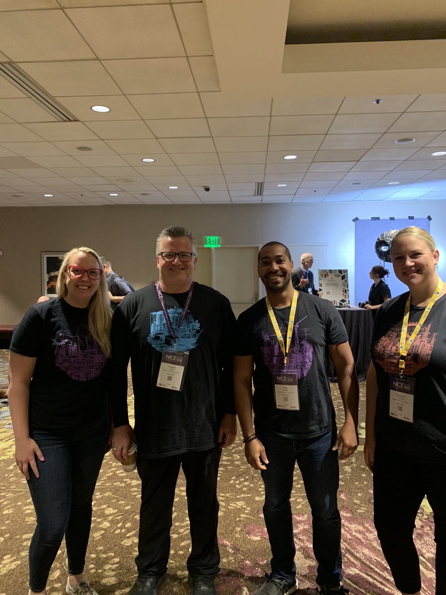 DOECyberForce's tweet photo. When at #NISTConference and the swag is 🔥 you have to take photos and commemorate the last few year #CyberForceCompetition shirts. #dresstoimpress https://t.co/Ya8uv9DYMk