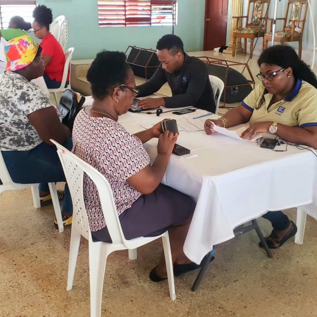 NWCjam's tweet image. #HappeningNow |  NWC Regularization activities in Weetom Lane, Newland Road in Portmore at the Four Square Gospel Church. Residents are getting an opportunity to settle outstanding balances and apply for new supply connection.
#Regularization #NWC #ServingYou