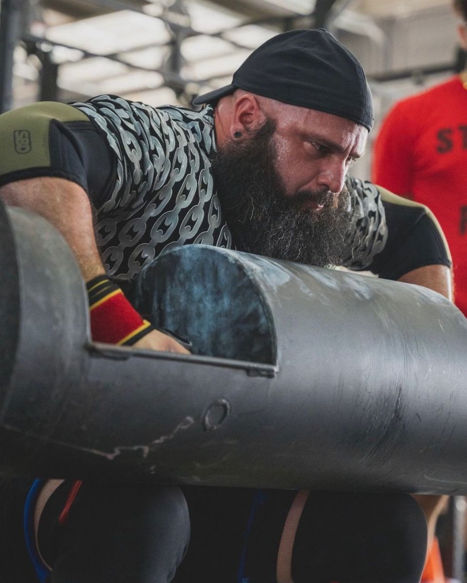 Nothing can stop #irontitan from crushing his goals. He’s wearing our Strongman  Corporation Unisex Super Grip shirt – Silver Chain Link   

Get yours today and unleash your inner titan! 

bit.ly/3qyM4mI