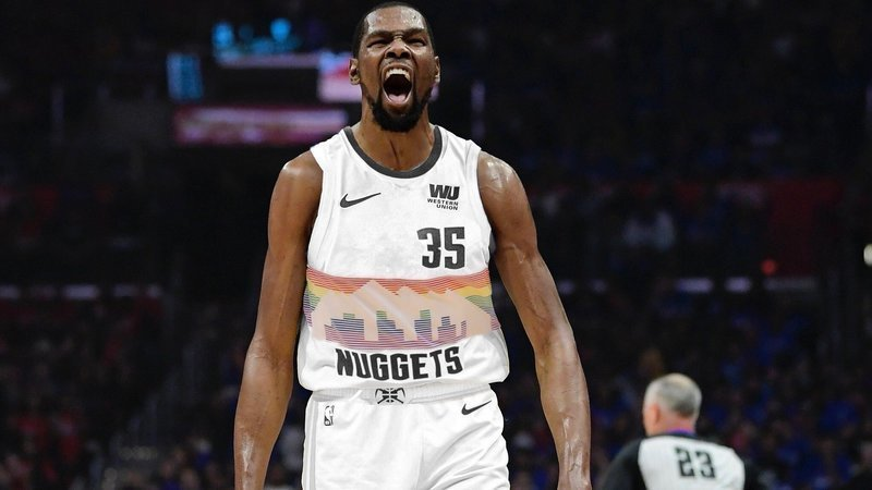 TheRimReporter's tweet photo. BREAKING: Kevin Durant has requested a trade from the Phoenix Suns. His preferred destinations include joining the Miami Heat to push for a finals run or join Nikola Jokic in Denver https://t.co/8hCcTICLUp