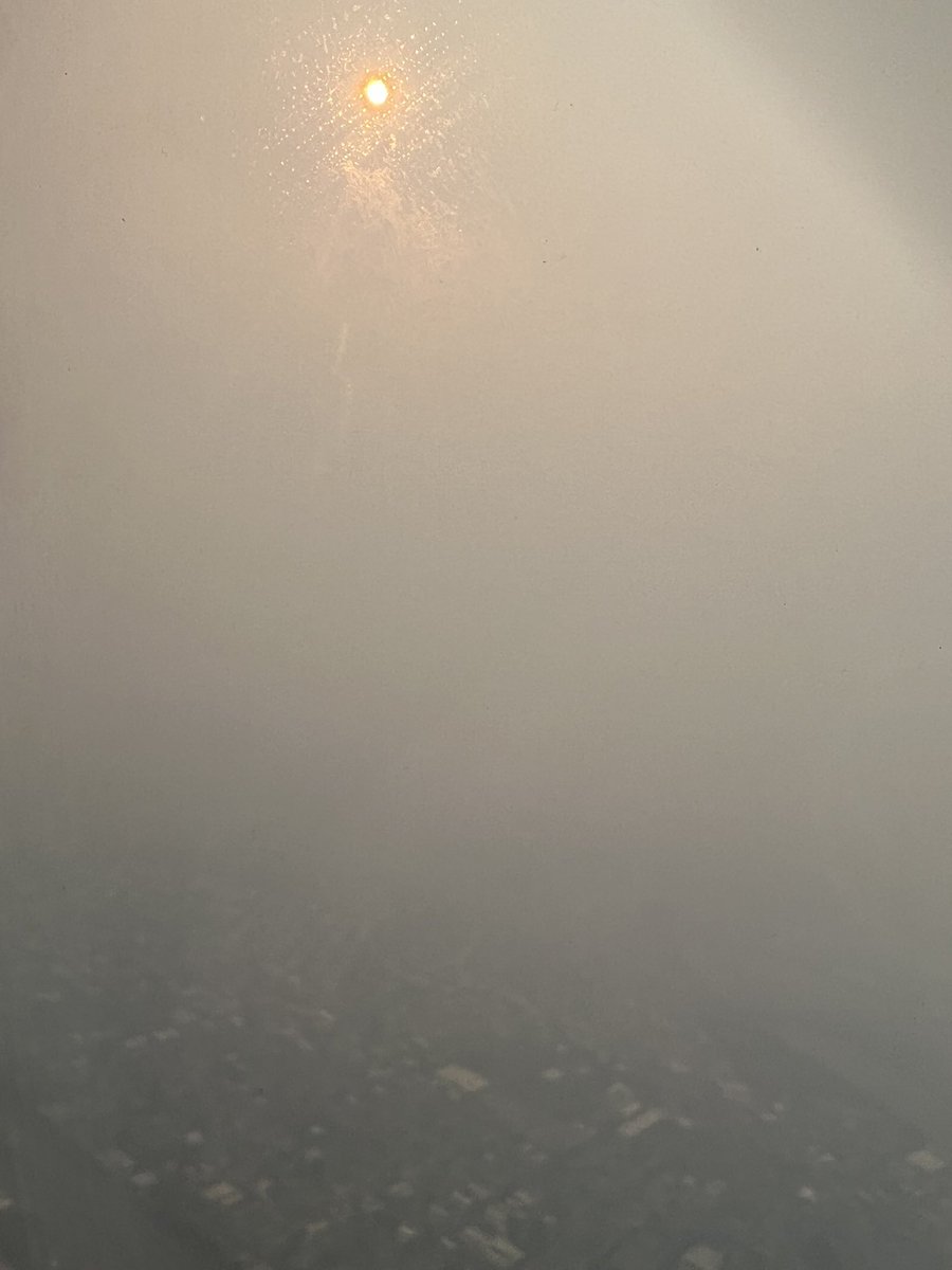 shawnlatur's tweet photo. As captured departing Newark Liberty moments ago: NJ cloaked in wildfire smoke, blue skies above the plume.

Headed to talk #climate and #EnvironmentalJustice leadership alongside @EPA @EPAresearch + other pros at the @AirandWaste Mgmt conference.

I’m going to have a lot to say. https://t.co/lt17muIJGa