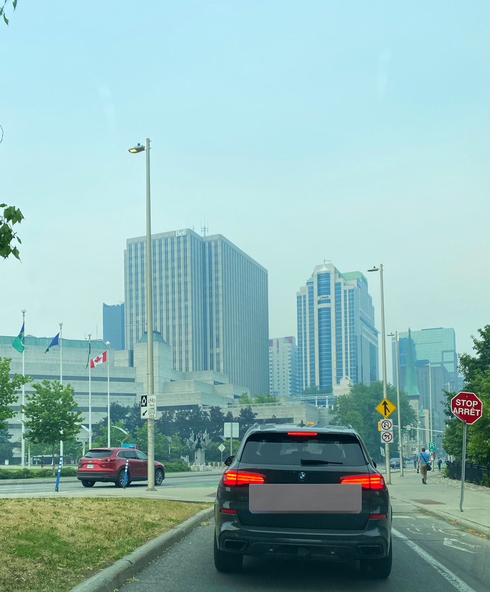 PaoloUtano's tweet photo. During today’s commute to the office…A thick haze, from wildfires in northern Quebec and parts of Ontario, blankets Ottawa this week.  Stay safe. https://t.co/3xTWv4dclj