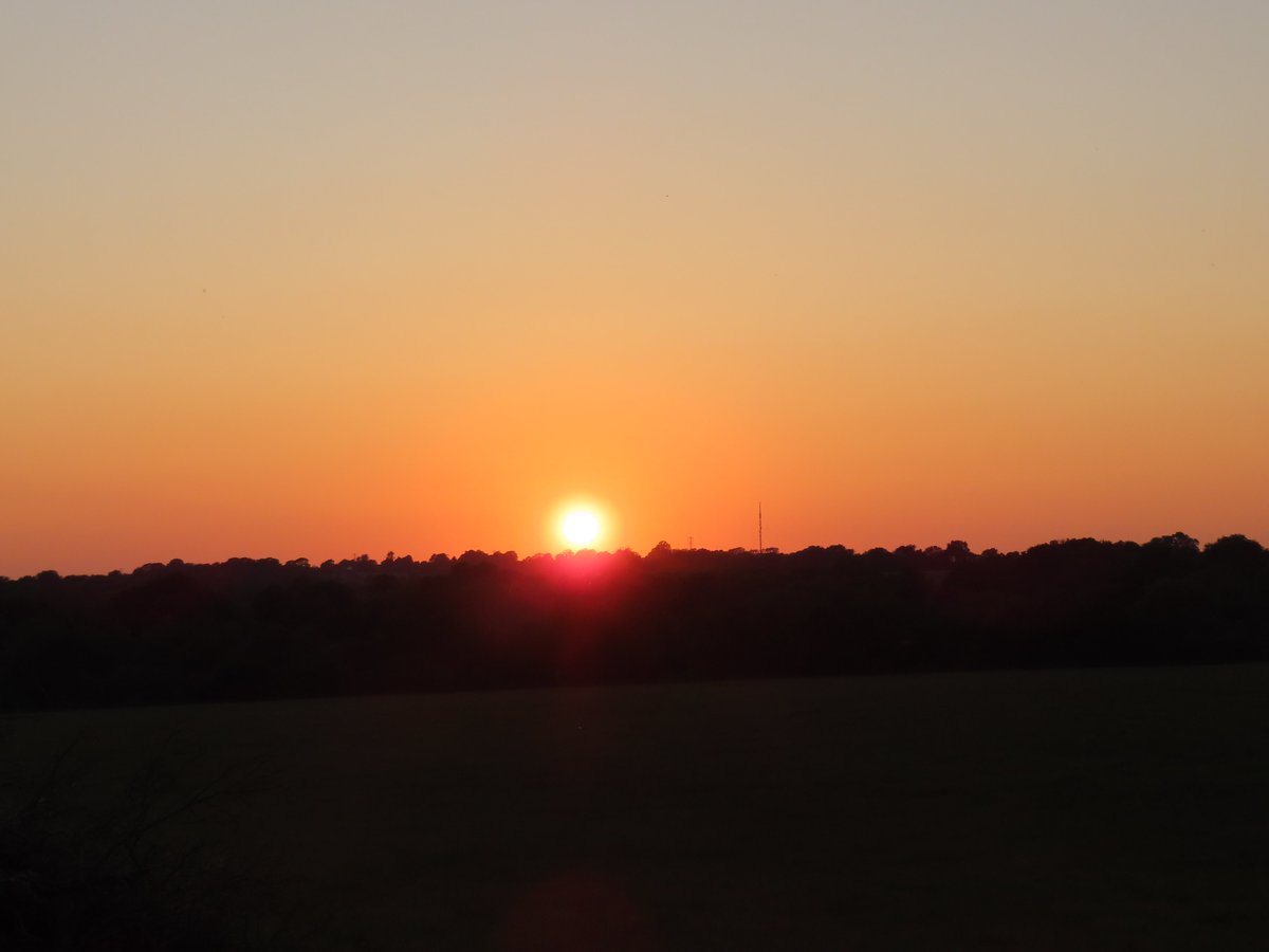 a cloudless apricot sky goodbye this June Wednesday .. sunset over Warren Bottom Copse while cuckoo calling .. Hannington mast to the right of the fireball, NE Hampshire #30DaysWild