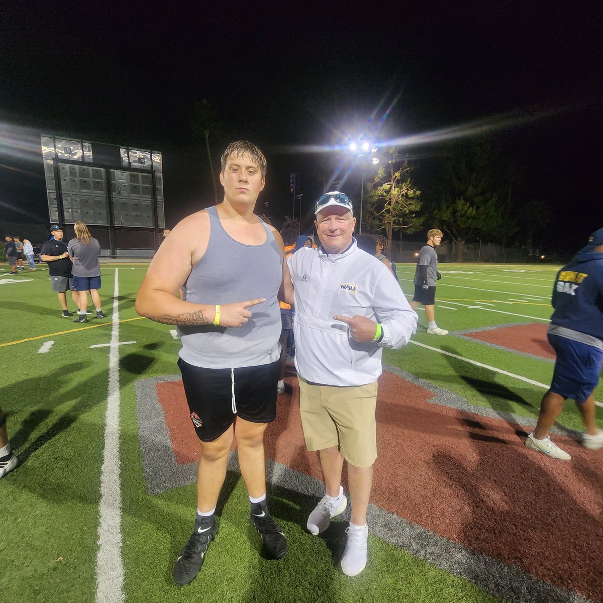 @AshdonWnetrzak with the Head Coach @CoachBall from @NAU_Football right after receiving his offer. Thank you Coach for your faith in Ashdon future! @OfficialKOBros @CoachBriscoeWR @SierraCanyonFB @247Sports @GregBiggins #UniversityofRedlands #megacamp