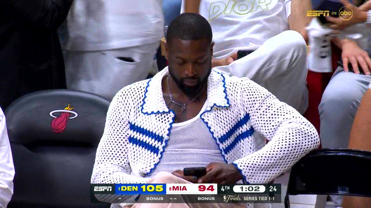 ClutchPoints's tweet photo. Who do you think Dwyane Wade is texting? 🤔 https://t.co/7gJ3BODv5s