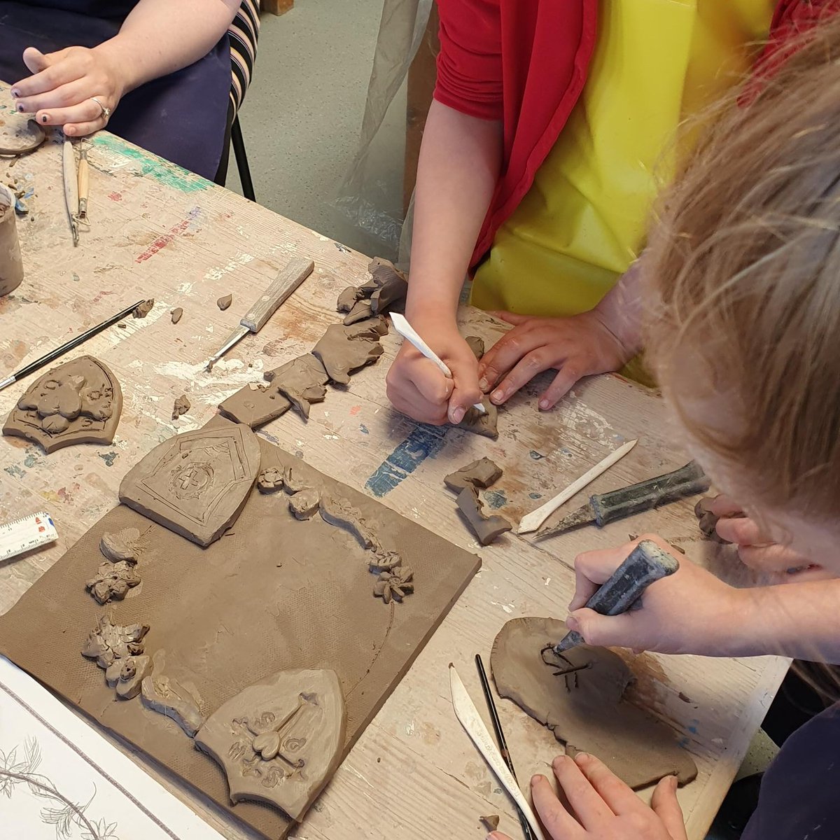 Our #ArtistoftheWeek for this week is Sacred Heart Primary School. A small group of year 5 students joined us from Sacred Heart to produce ceramic plaques. The plaques symbolise the strong bond between each school. All students behaved and applied themselves superbly.