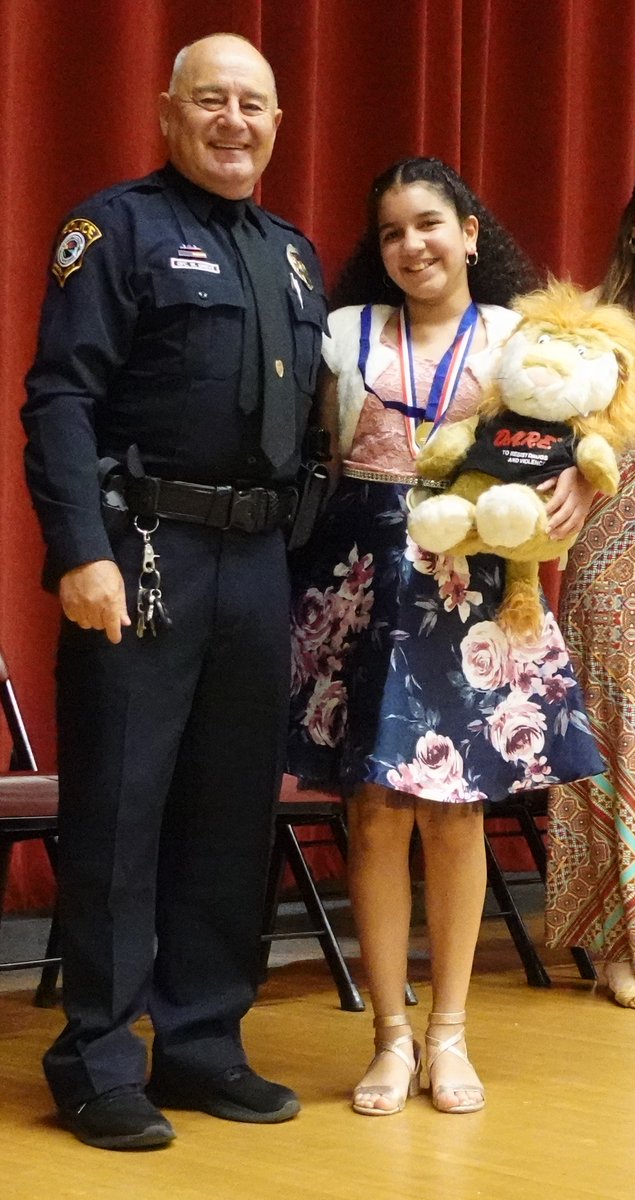 Congrats to <a href="/CoconutCreekES/">CoconutCreekElem</a>'s nearly 75 DARE [Drug Abuse Resistance Education] graduates! Ofc Grieve, the school's #SRO, led the 10-week course to each of the school's 5th-grade classes. School leaders also dedicated a portion of this morning's #MovingUpCeremony to #DARE.