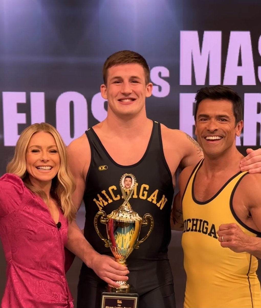 Teaching some wrestling technique the hard way this morning on <a href="/kellymarklive/">KellyMarkLive</a>. Thanks for spotlighting <a href="/Parris58/">Mason Parris</a> and our great sport, <a href="/MarkConsuelos/">Mark Consuelos</a> <a href="/KellyRipa/">Kelly Ripa</a>! 👏🤣 #GoBlue