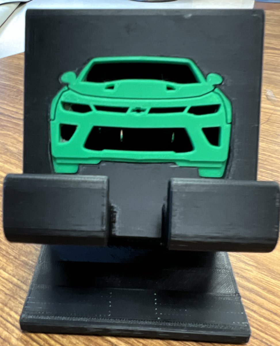 One of my first graders made this phone holder on a 3D printer as my gift this year!
