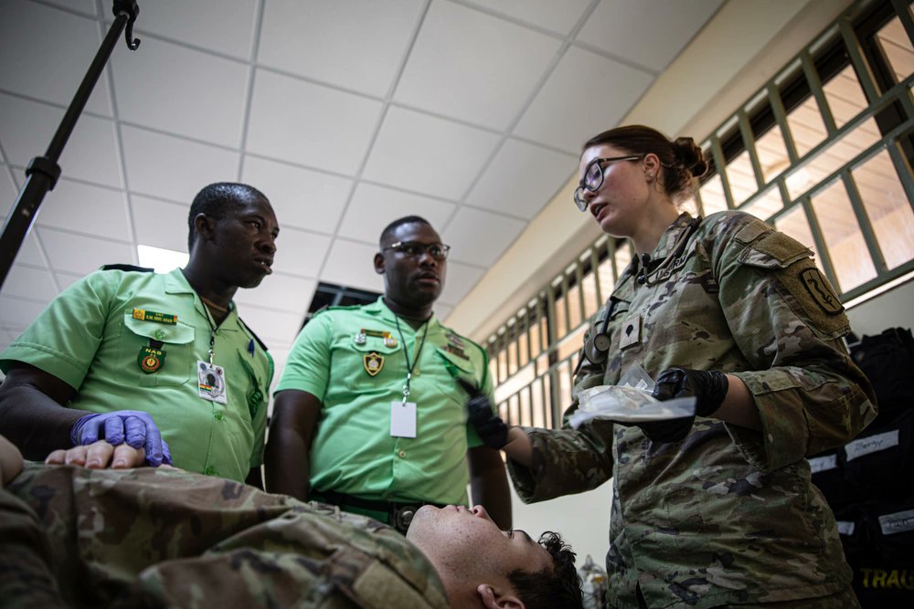 USSOCAF's tweet photo. A medical event between U.S. Army Soldiers training with the 30th Medical Brigade showcased that quality medical care is essential to exercise readiness and mission success during #Flintlock23 in Tamale, Ghana. https://t.co/pJO00dQWLo