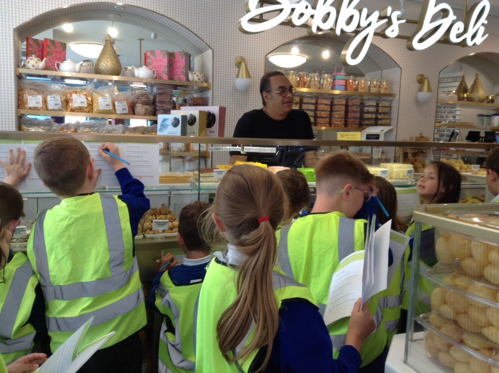 latimerprimary's tweet image. Here we are in a traditional Indian sweet shop! It was really interesting, lots of yummy things! #LatimerRE #3PS #3JK