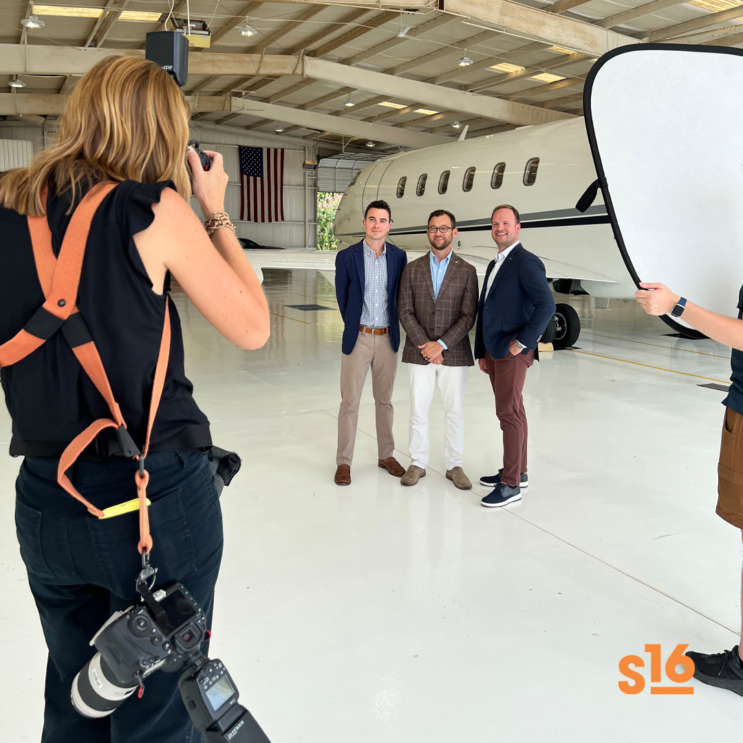 station16's tweet photo. POV: Your company gets their headshots taken by the S16 team! 

📸: Annie Smith taking headshots for the Piedmont Jets crew! https://t.co/WM8QXNG2aK