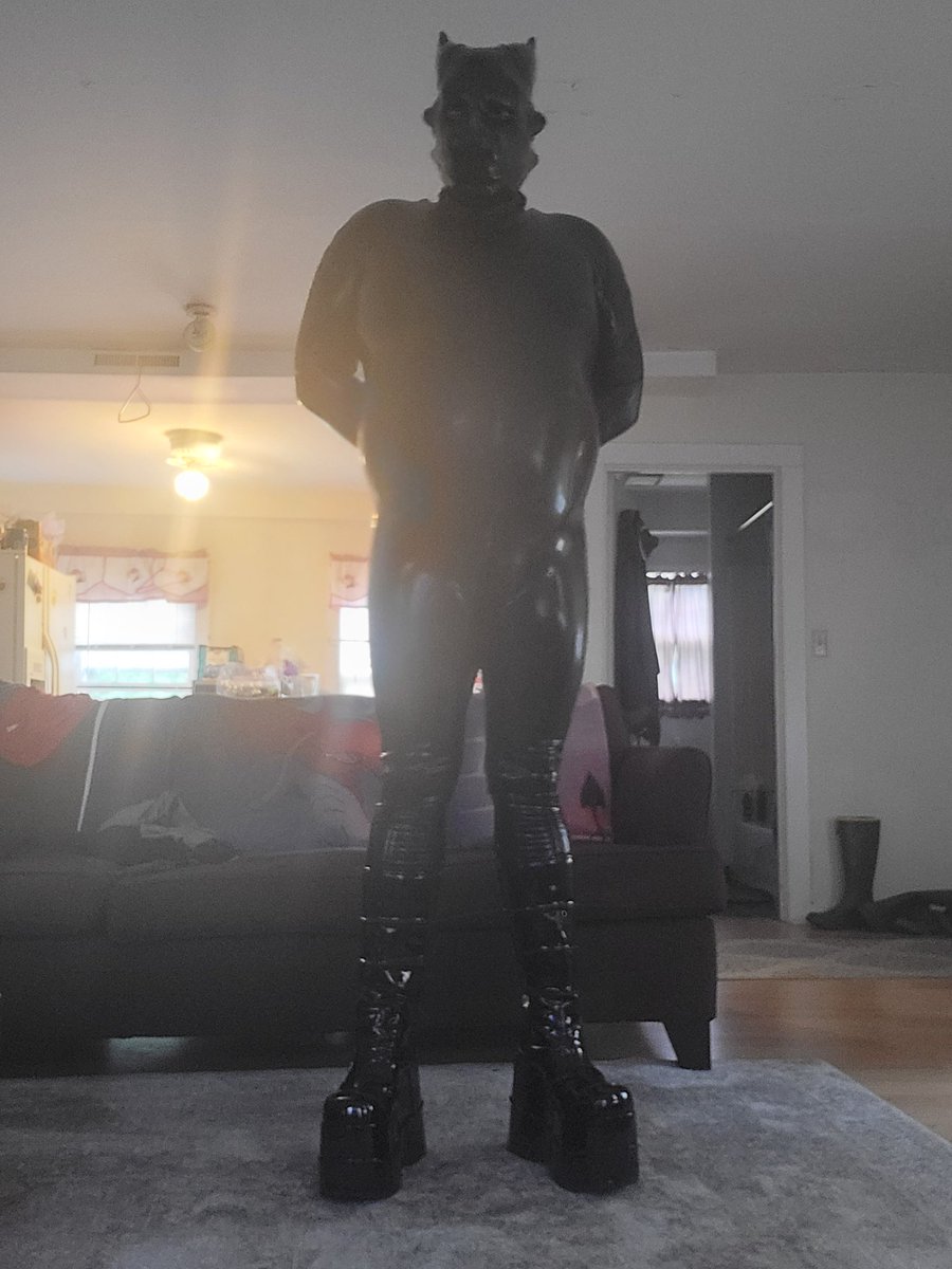 Tall rubber dragon with a face