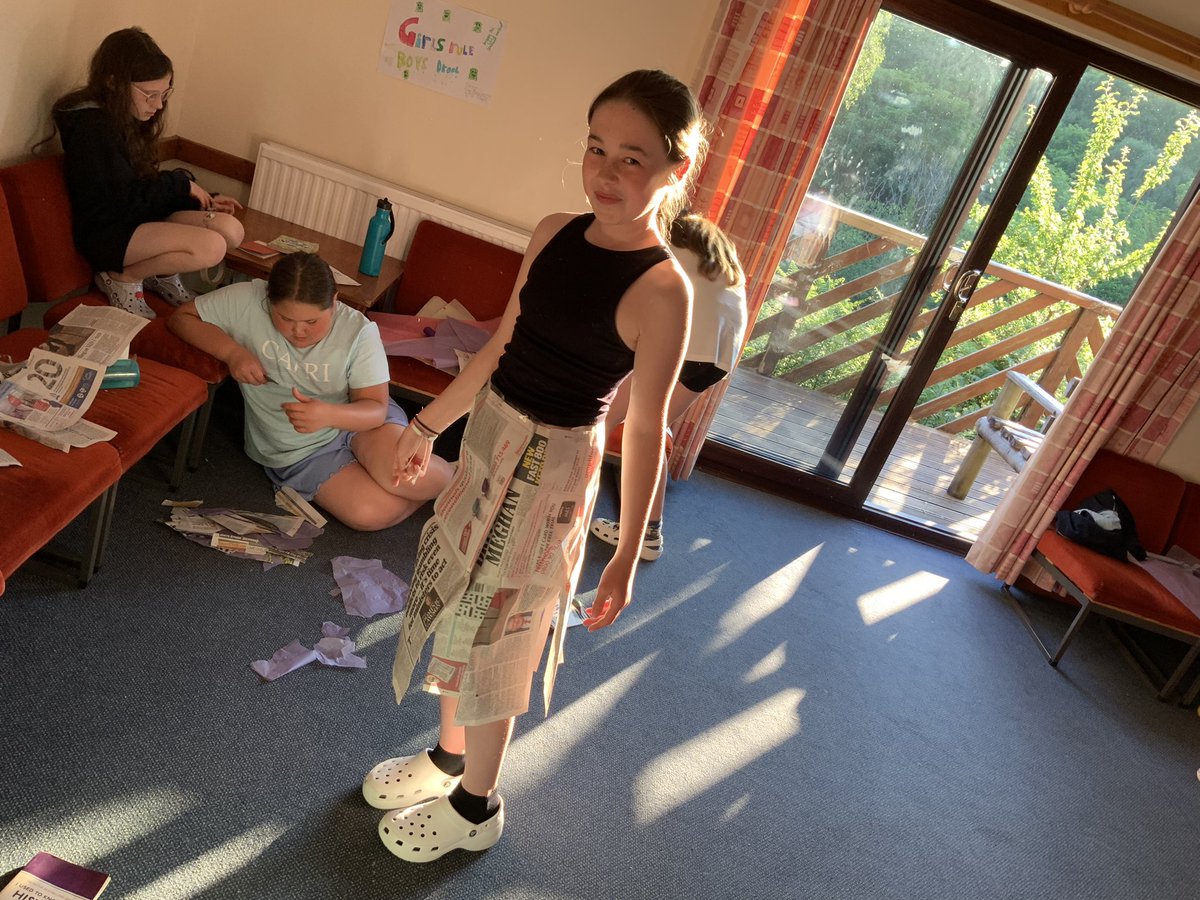 What would you create if you had a toilet roll, newspaper, cello tape and some tissue paper? Have we any budding fashion designers??