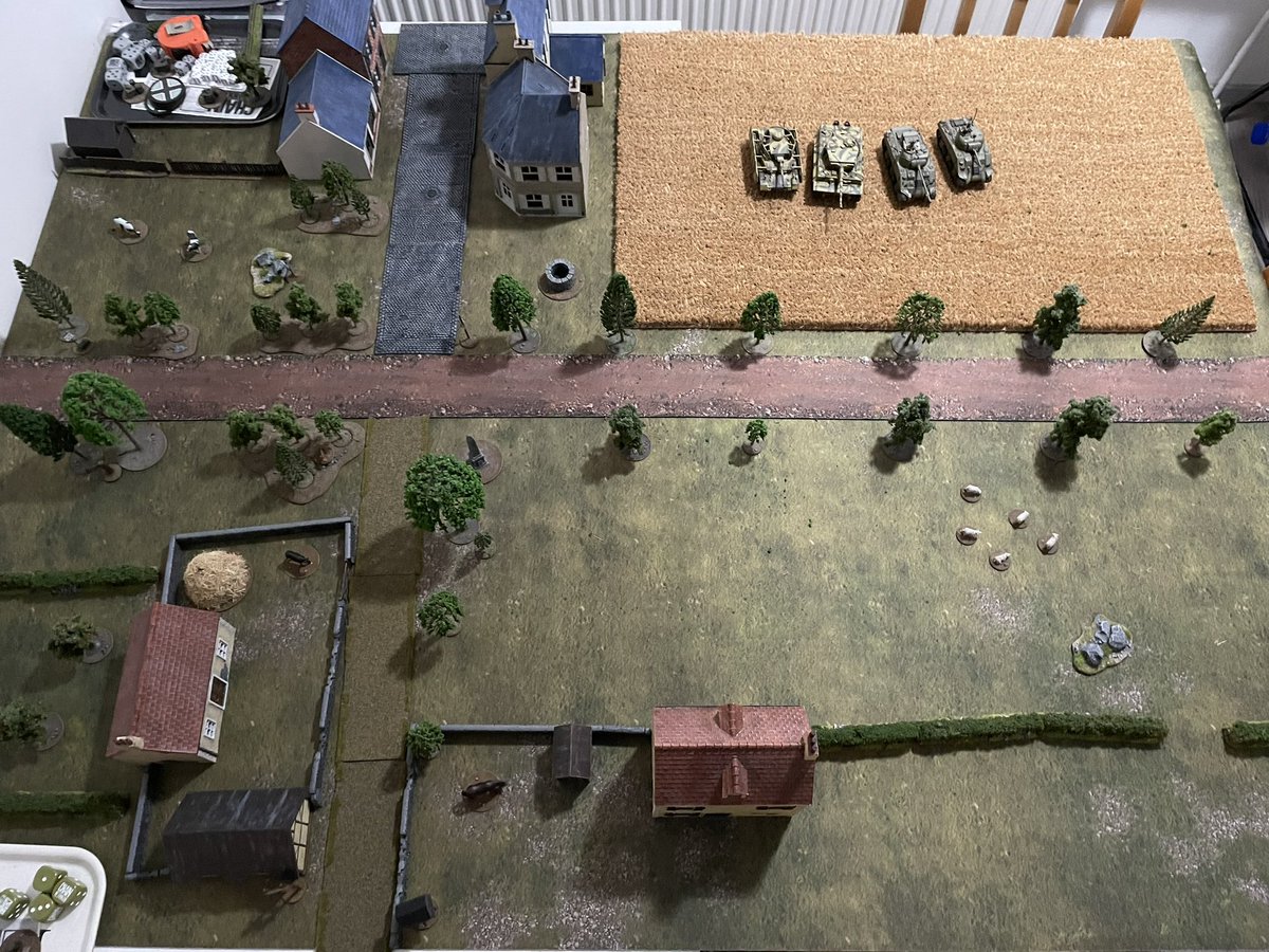 Preparing the table for a game of #ChainofCommand for the weekend. Based -loosely- on the first mission of the Martlet campaign. 

#wargaming #spreadthelard