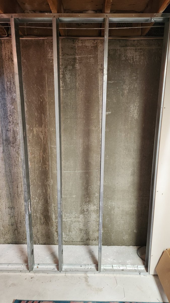 The previous owner of my home attempted to start finishing the basement himself...let's just say mistakes were made...how does one space studs so wrong!?