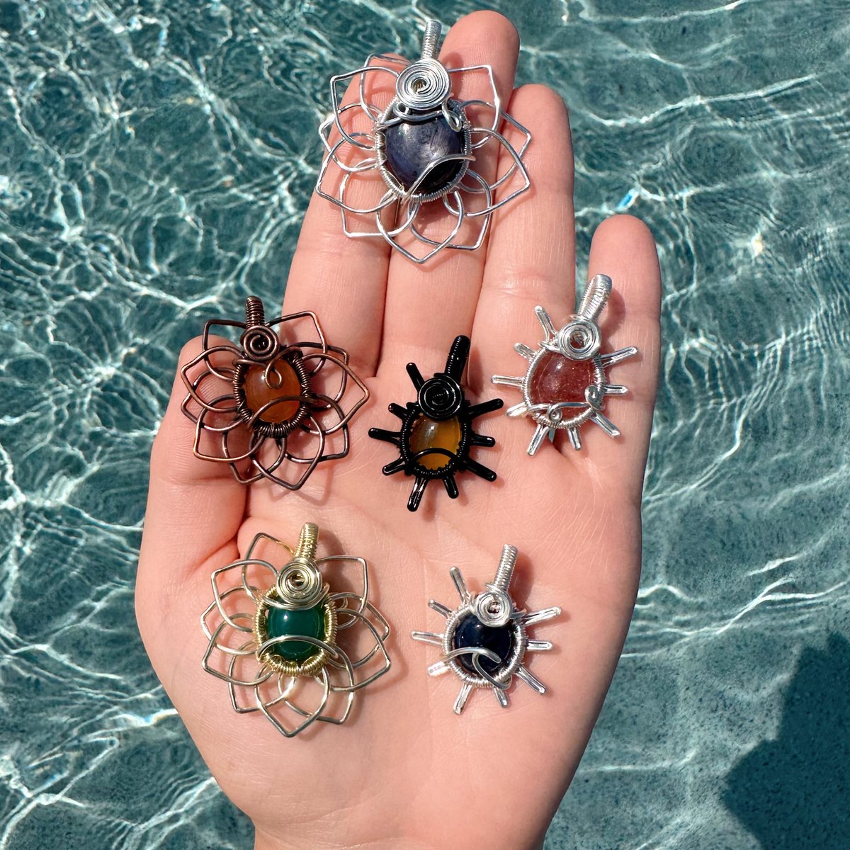 handfuls of baby sun & flower pendants🌈

available June 9th (tomorrow) 8pm est