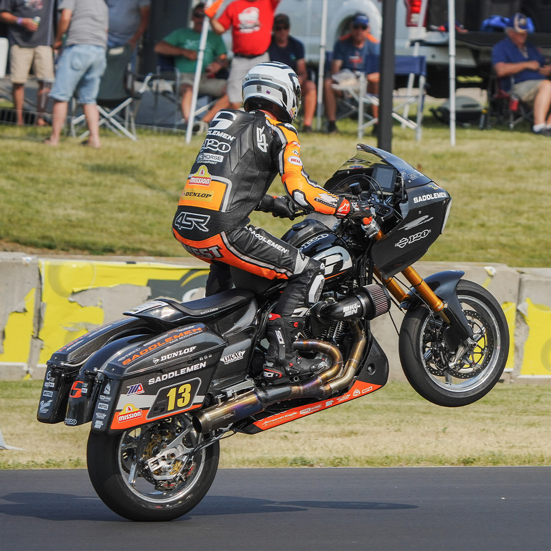 Cory West headed East for @MissionFoodsUS King Of The Baggers at @RoadAmerica, and he also went a little North, too, as in to the sky with the front wheel on his Team @Saddlemen_USA @HarleyDavidson #motorcycle #bagger #racing