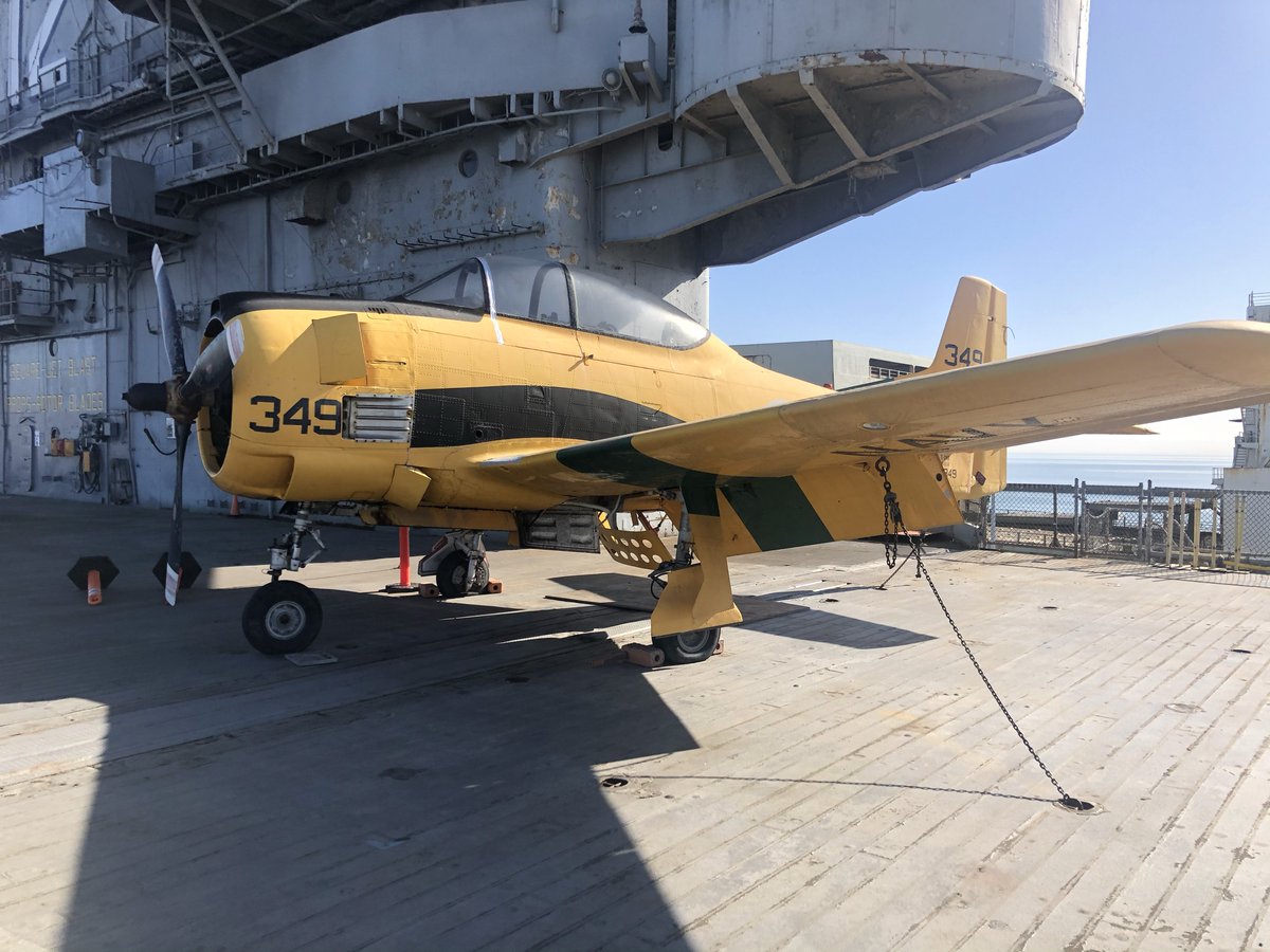 HornetMuseum's tweet photo. What is your favorite propellor plane of the USS Hornet collection? T-28B Trojan? TBM-3E Avenger? US-2B Tracker? FM-2 Wildcat? #usshornet #usshornetmuseum #navalaviation #s2tracker #f4fwildcat #tbmavenger #t28trojan https://t.co/xIDB1bppqK