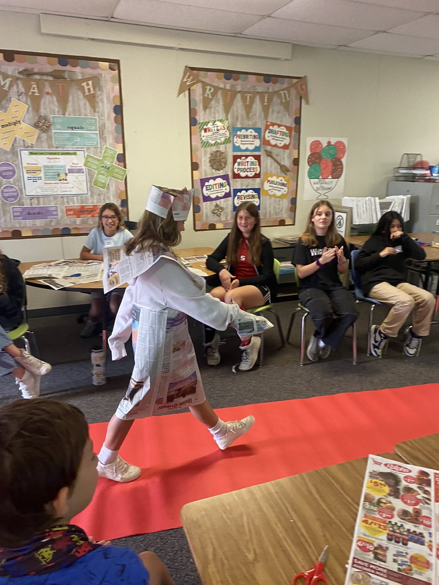 KelleeYoder's tweet photo. Our first day of 6th grade orientation today, “Shark Week” was a blast today! We had a newspaper fashion show in my room. Teamwork, creativity &amp; design from day 1! https://t.co/MSzFA1d5Wf